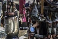 Closeup shot of vintage things, a steampunk glasses, belts, and gas mask on rusty pipes