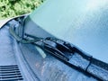 Early morning dew on the front car`s surface. Royalty Free Stock Photo