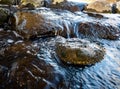 Closeup shot of waterfall steam with the huge rocks Royalty Free Stock Photo