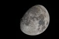 Closeup shot of The Waxing Gibbous Moon with visible craters and the Sea of Tranquility Royalty Free Stock Photo