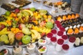 Closeup shot of wedding food decorations with fruit compositions and desserts