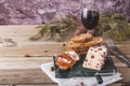 A closeup shot of Wensleydale cheese with cranberries and wine. Royalty Free Stock Photo