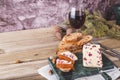 A closeup shot of Wensleydale cheese with cranberries and wine. Royalty Free Stock Photo