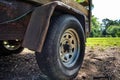 Closeup shot of the wheel of an old and rusty farm wagon Royalty Free Stock Photo