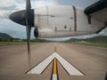 Closeup shot of a white and black airplane in an air field in Vietnam Royalty Free Stock Photo