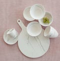 Closeup shot of a white ceramic set with bowls