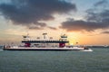 Closeup shot of a white ship sailing in Galveston Island, USA at sunset