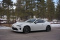 Closeup shot of a white Toyota 86 car parked in Bryce National Park in winter