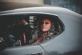 Closeup shot of a woman driving an old car in Nybro, Sweden
