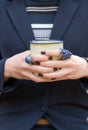 Closeup shot of a woman holding tea mug. Close up of young woman Royalty Free Stock Photo