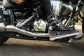 Closeup shot woman in leather boots sitting on bike