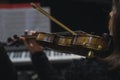 Closeup shot of a woman playing violin on a blurred background Royalty Free Stock Photo