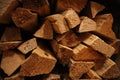 Closeup shot of wood logs stacked in a pile for firewood Royalty Free Stock Photo