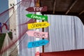 Closeup shot of the wooden colorful notice board at the street Royalty Free Stock Photo