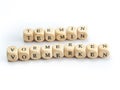 Closeup shot of wooden cubes with the letter TERMIN VORMERKEN isolated on a white background Royalty Free Stock Photo