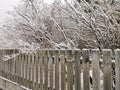 Closeup shot of a wooden fence in Larvik, Norway in winter Royalty Free Stock Photo