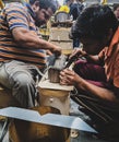 Closeup shot of workers arranging the internal parts of the transformer