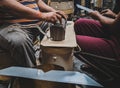 Closeup shot of workers arranging the internal parts of the transformer