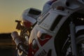 Closeup shot of a Yamaha FZR motorbike in the sunset