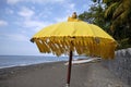 Closeup shot of a yellow beach umbrella with an Asian style Royalty Free Stock Photo