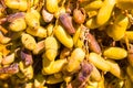 Closeup shot of yellow brown dates Royalty Free Stock Photo