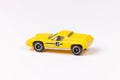 Closeup shot of a yellow Matchbox 1972 Lotus Europa Special LOTUS isolated on a white background