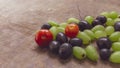 A closeup shots of grapes angoor tamatar tomato