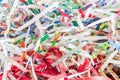 Closeup shredded paper texture and reuse colorful paper scrap of document background. Selective focus image Royalty Free Stock Photo