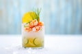 closeup of shrimp cocktail on ice with lemon wedge Royalty Free Stock Photo