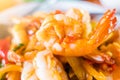 Closeup shrimp , stir-fried shrimp and basil On the plate . thai spicy food