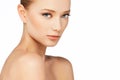 Girl with beautiful spotless skin naked shoulders closeup shot natural makeup Royalty Free Stock Photo