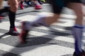 Closeup on marathon runners legs and feet with motion blur Royalty Free Stock Photo