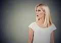 Closeup side view profile portrait woman talking with open mouth Royalty Free Stock Photo