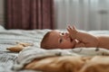 Pretty baby with thumb in its mouth Royalty Free Stock Photo