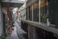 Train goes through a tiny street in Ha Noi, Viet Nam Royalty Free Stock Photo