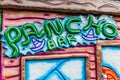 Sign with the name: Pancho Bar, green letters on a blue background