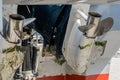 Closeup of silver props on twin outboard boat