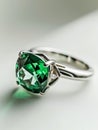 Silver ring with green emerald gemstone. Royalty Free Stock Photo