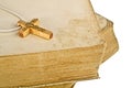 Closeup of simple wooden Christian cross on open old book Royalty Free Stock Photo