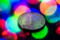 Closeup of 1 Austrian schilling coin on a bokeh background