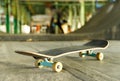 Closeup of skateboard in skateboard park, indoors, blurred background Royalty Free Stock Photo