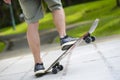 Closeup of skateboarder legs