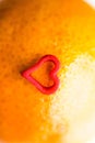 Closeup of the skin of Mandarin with a heart.