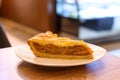 Closeup of a slice of cinnamon apple pie on a plate.