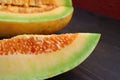 Closeup a Slice of Delectable Juicy Fresh Ripe Thai Melon on Wooden Table Royalty Free Stock Photo