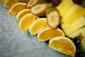Closeup sliced bananas, oranges and pineapples on big plate Royalty Free Stock Photo