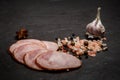 closeup sliced pieces of smoked ham sausage with garlic Royalty Free Stock Photo