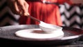 Closeup slow motion view of steaming hot `Dosa` on a nonstick pan