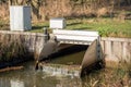 Small stainless steel weir in a stream