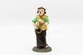 Figurine of a juggling clown white background